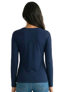 Woman wearing navy blue long sleeve Pima cotton loungewear top and jeans, back view