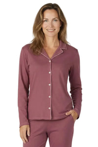 Woman wearing rosewood pink long sleeve button-up Pima cotton pajama set