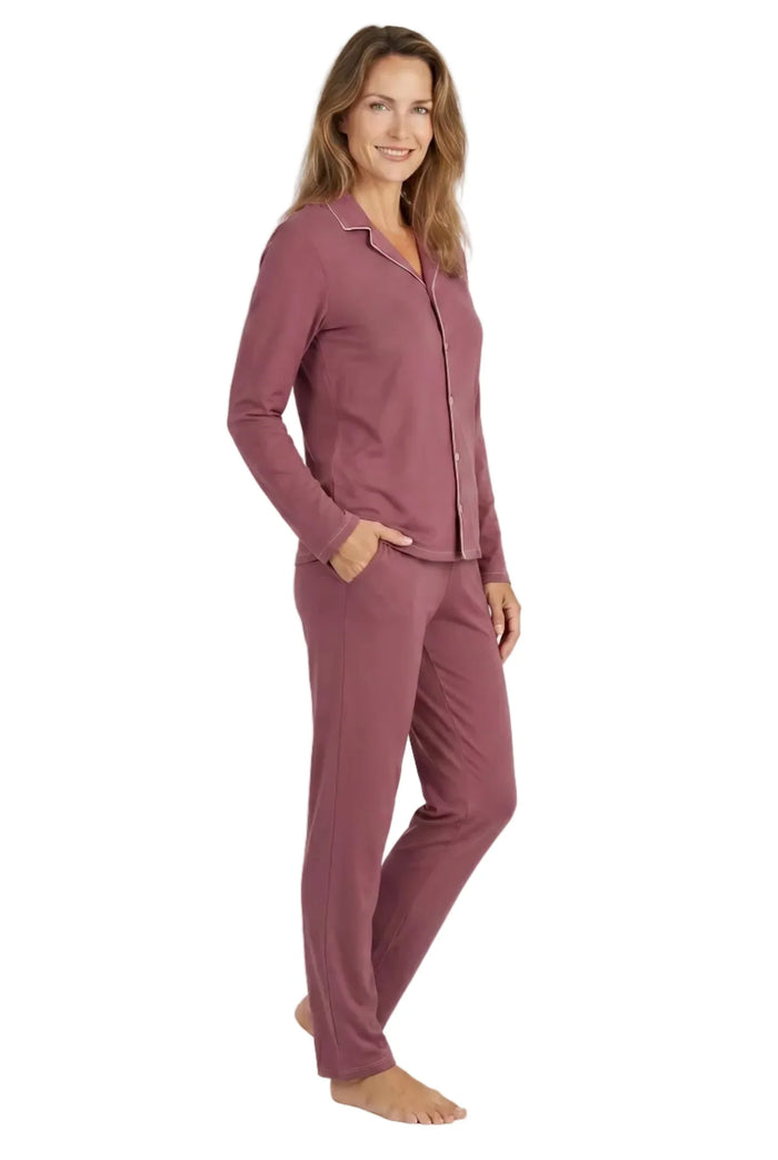 Woman wearing rosewood pink Pima cotton loungewear pajama set, long sleeve and pants