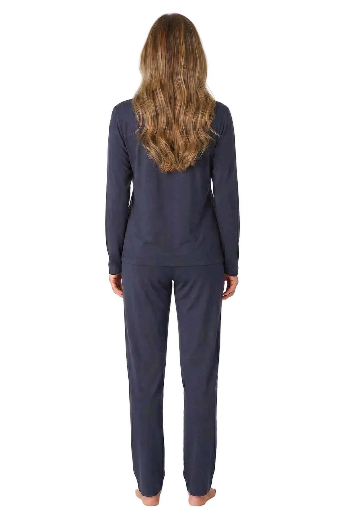 Woman in navy blue long sleeve loungewear set, seen from the back, on white background