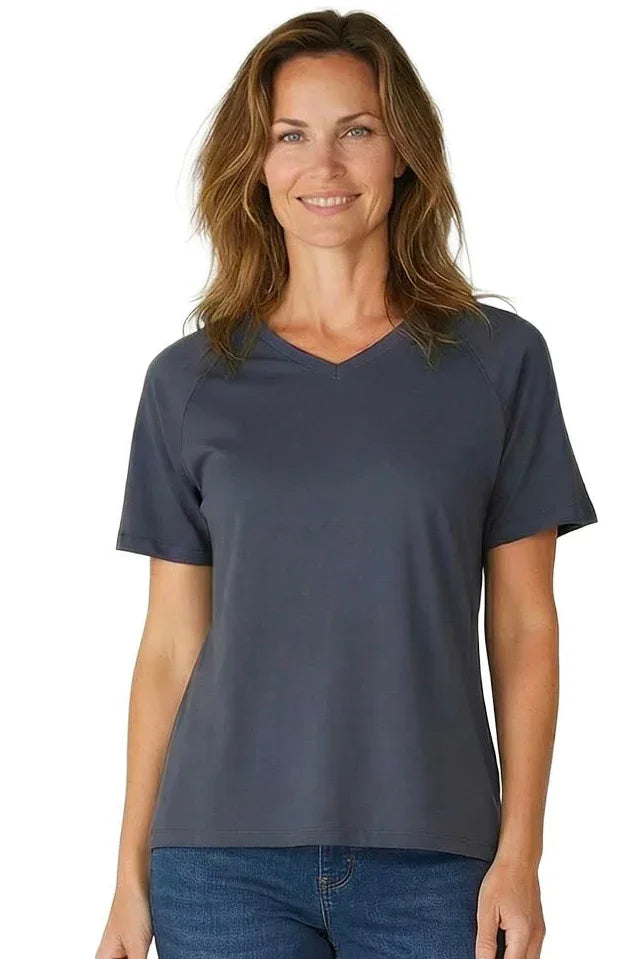 Woman wearing a short sleeve steel blue V-neck Pima cotton loungewear tee and jeans