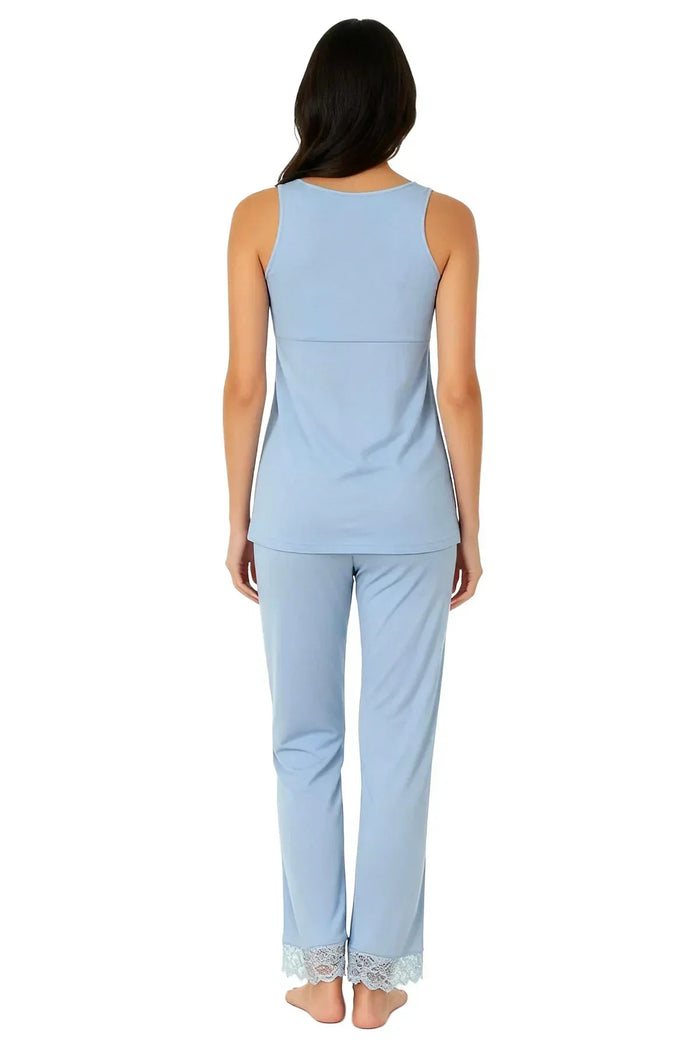Woman wearing light blue sleeveless loungewear set with lace hem pants, back view