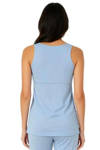 Woman wearing light blue sleeveless Pima cotton loungewear top and pants, back view