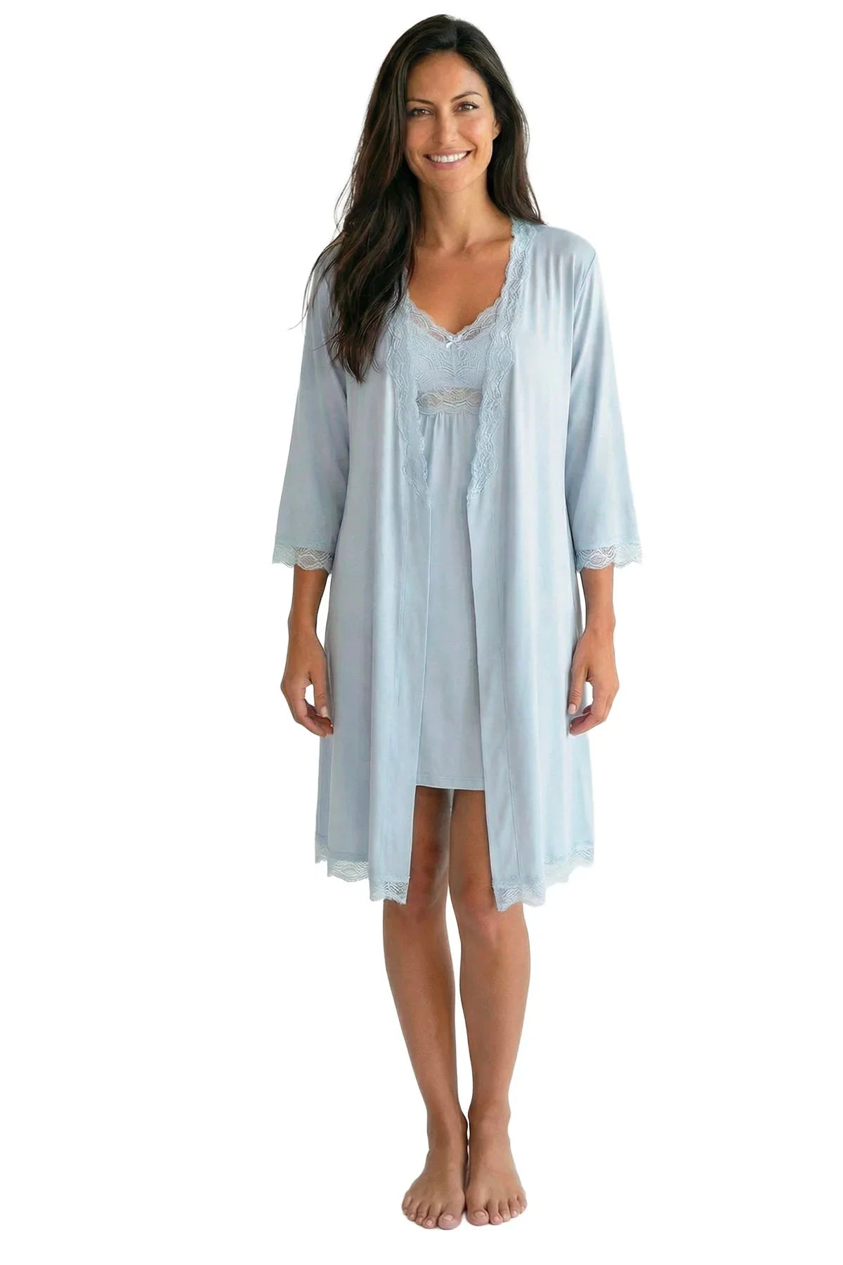 Woman in light blue lace-trimmed robe and matching nightdress, cozy loungewear sleepwear set.