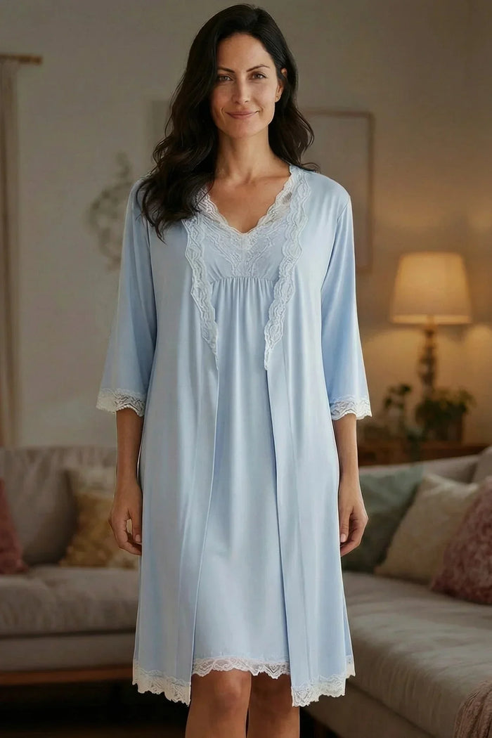 Woman wearing light blue chambray pajama set with lace trim on camisole and pants