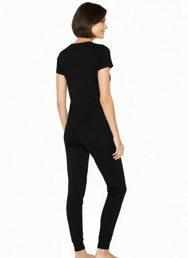 Woman wearing black Pima cotton loungewear set with short sleeve top and jogger pants