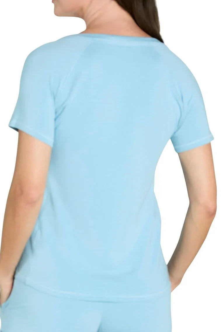 Back view of woman wearing sky blue short sleeve Pima cotton loungewear top and bottoms
