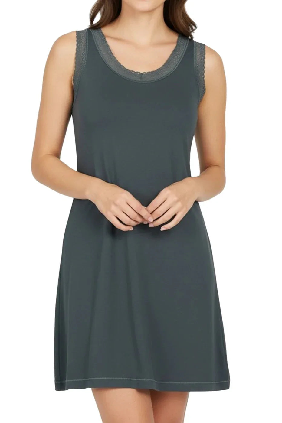 Woman wearing sleeveless dark green nightdress with lace trim on neckline and armholes