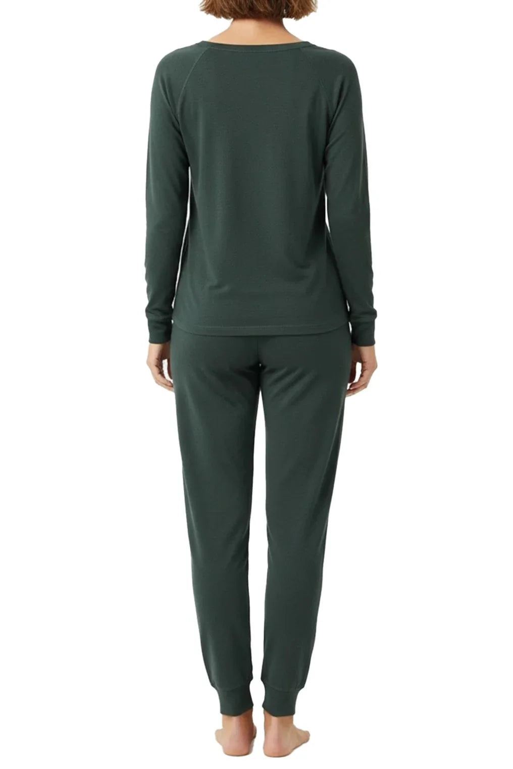 Rear view of a woman wearing dark green long-sleeve top and matching jogger pants loungewear