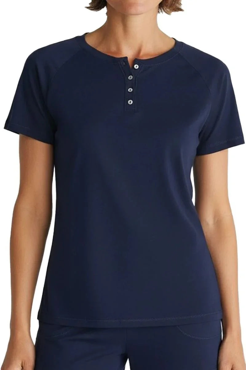 Woman wearing midnight blue short-sleeve henley shirt with four buttons
