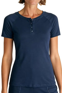 Woman wearing steel blue short-sleeve Henley shirt with button placket and round neckline